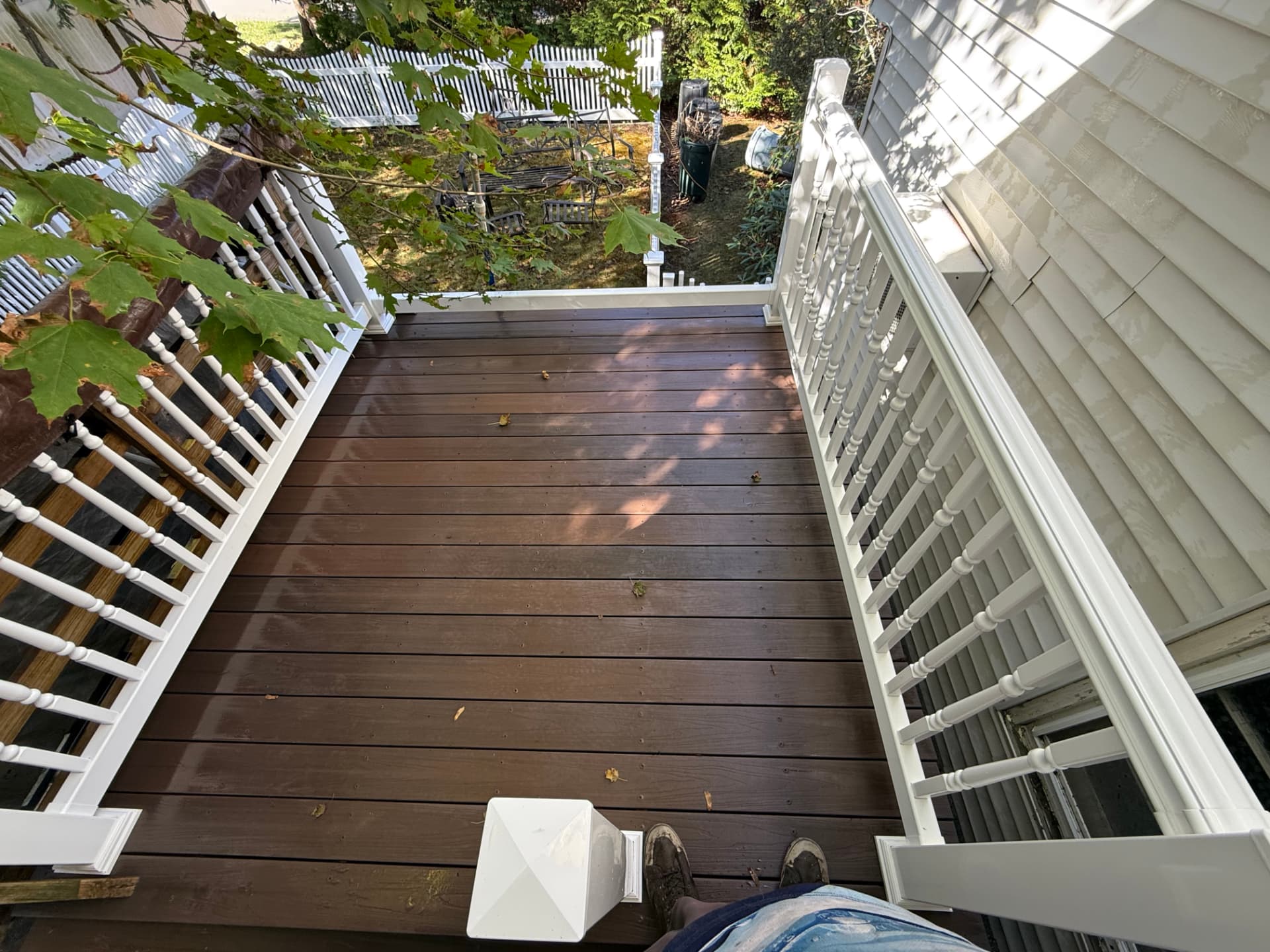 Deck boards washed clean showing the original wood color