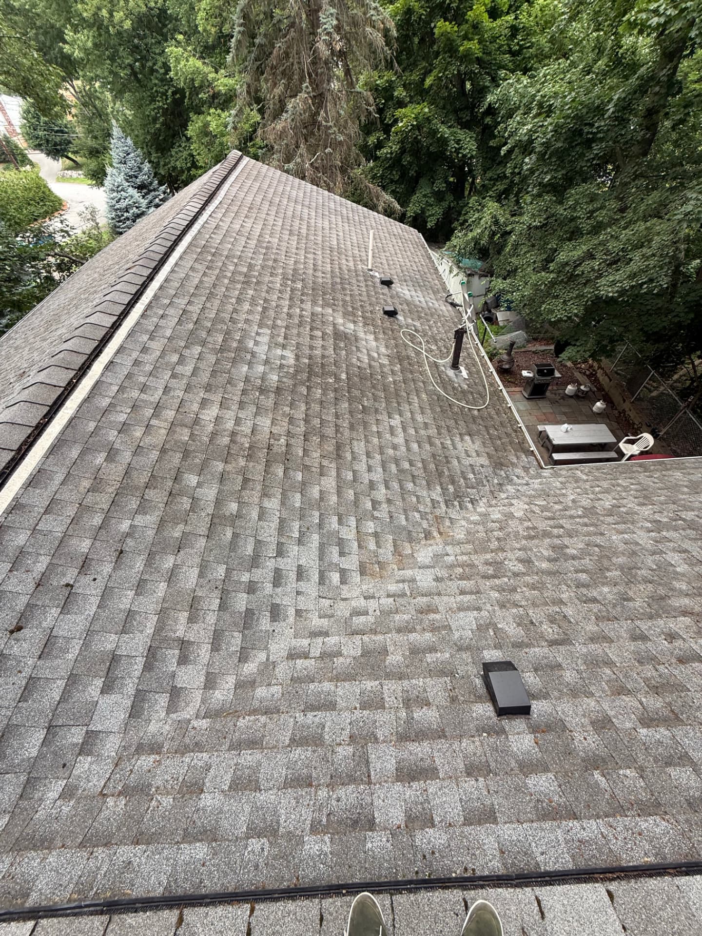 The same roof vent area clean with all moss and debris removed after washing