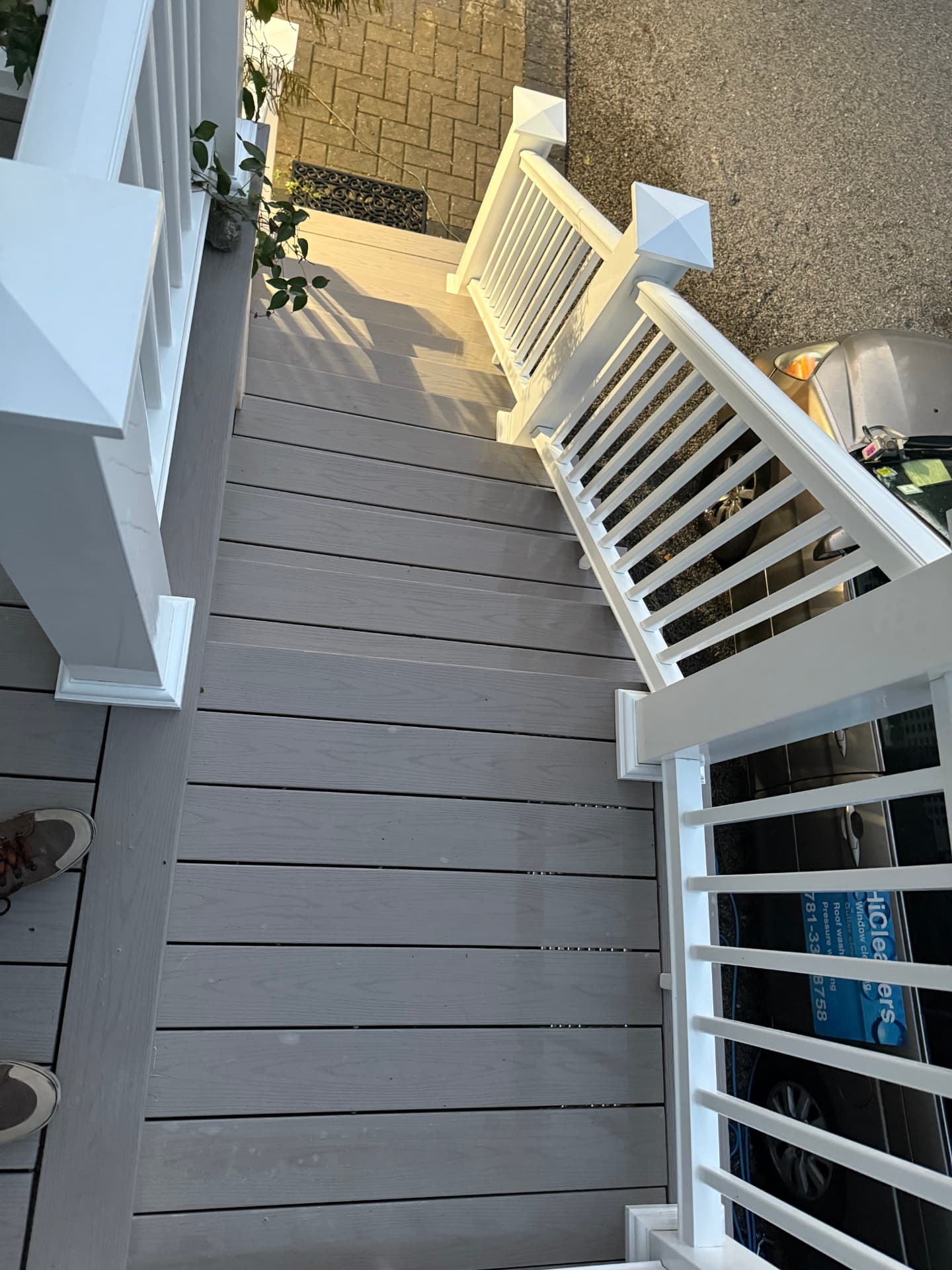 The same composite deck floor and rails washed clean from above