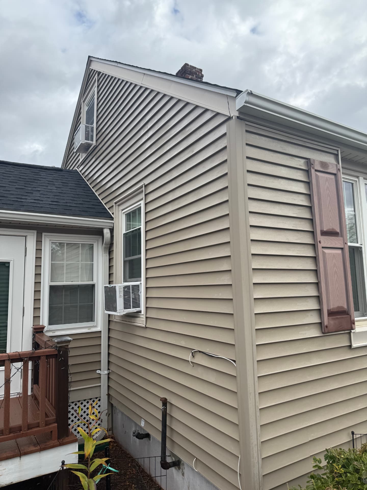 The same vinyl siding clean and streak-free after house washing
